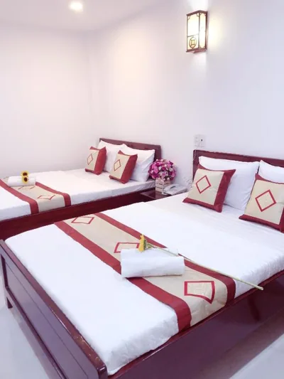 Superior Quadruple Room — Aurora Hotel
